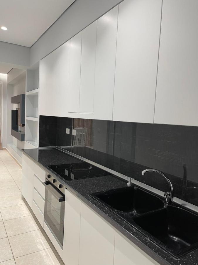 Emerald Inn Apartments โอริคูม ภายนอก รูปภาพ