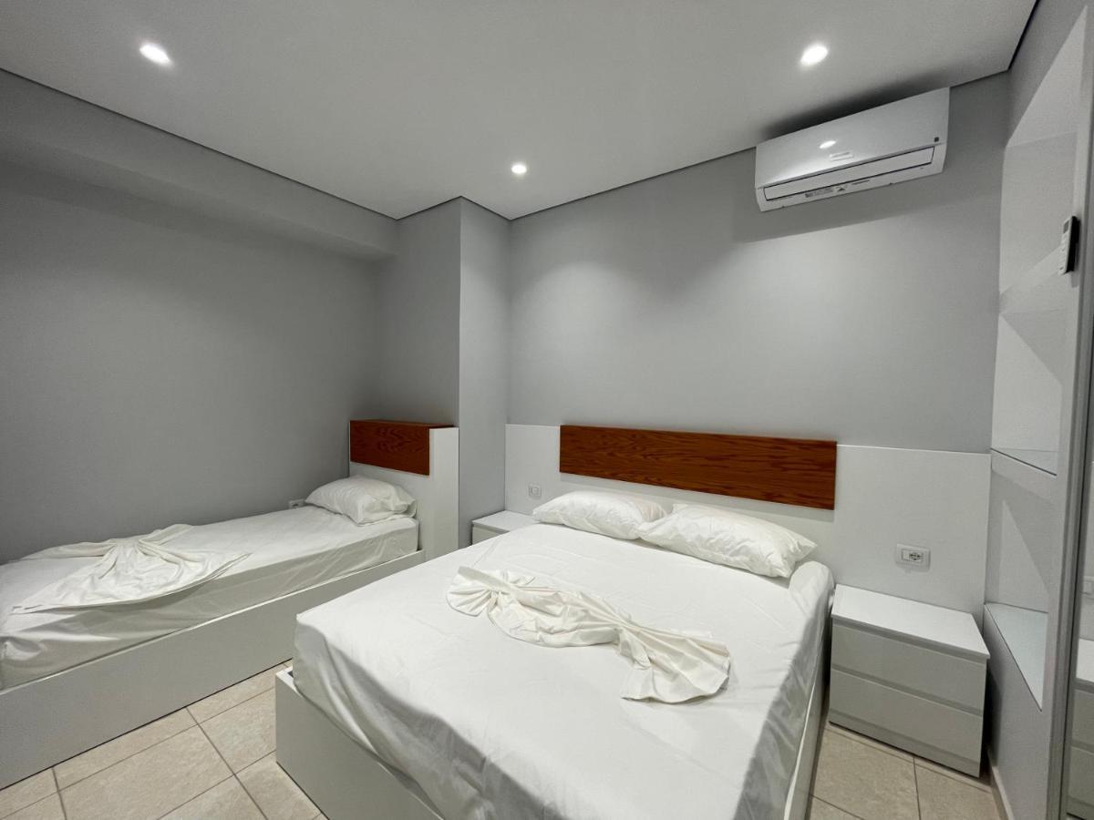 Emerald Inn Apartments โอริคูม ภายนอก รูปภาพ