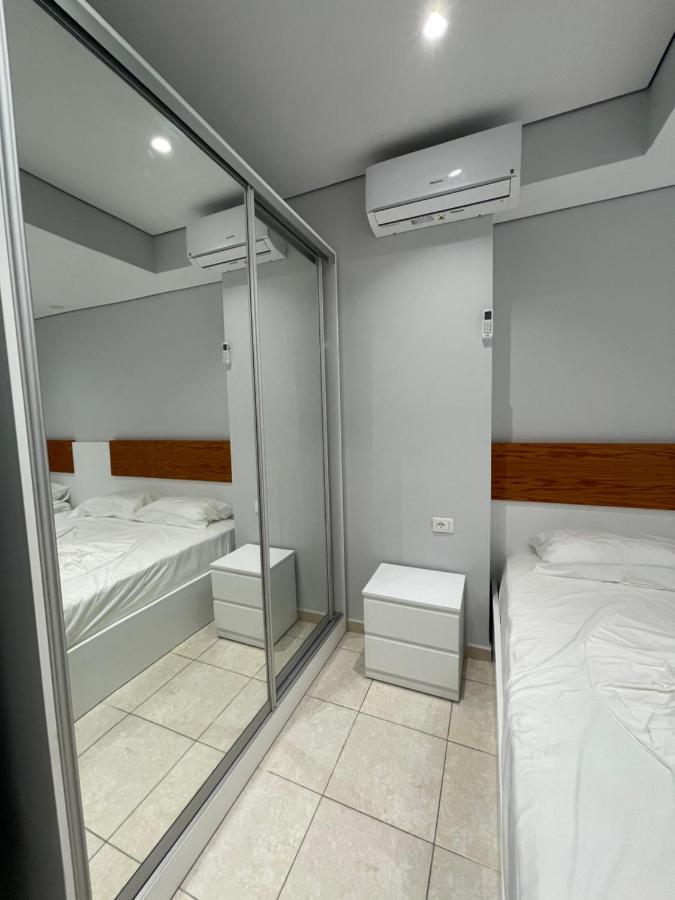 Emerald Inn Apartments โอริคูม ภายนอก รูปภาพ