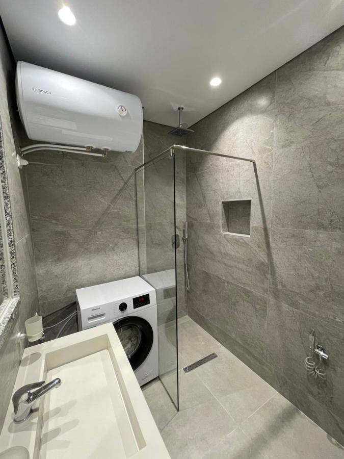 Emerald Inn Apartments โอริคูม ภายนอก รูปภาพ