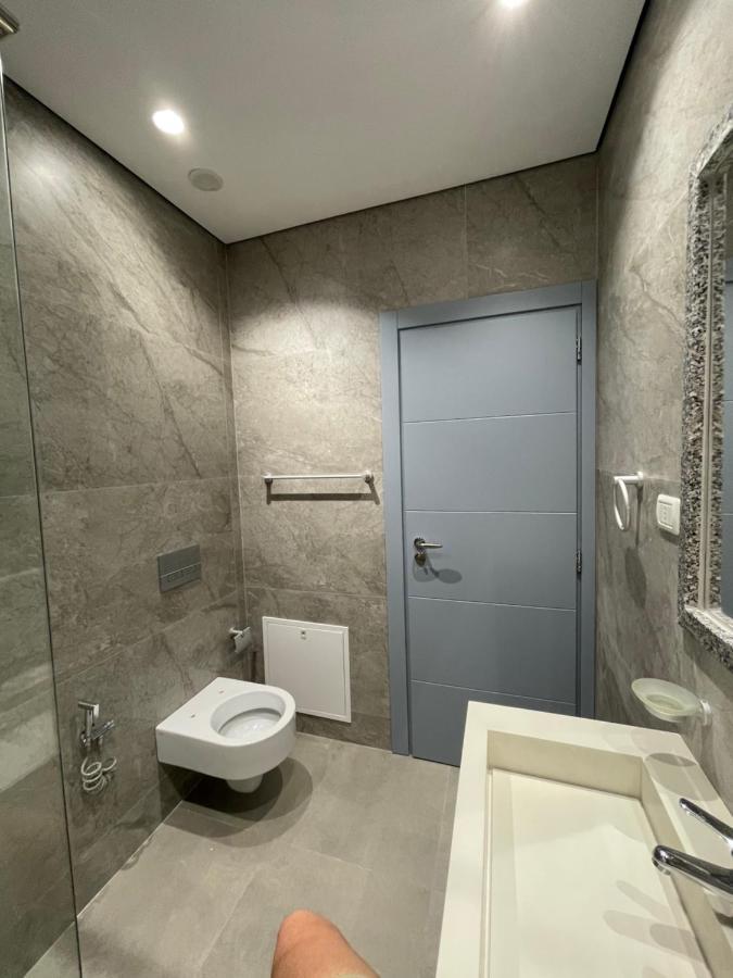 Emerald Inn Apartments โอริคูม ภายนอก รูปภาพ
