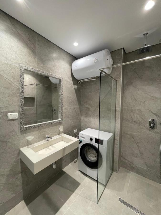 Emerald Inn Apartments โอริคูม ภายนอก รูปภาพ