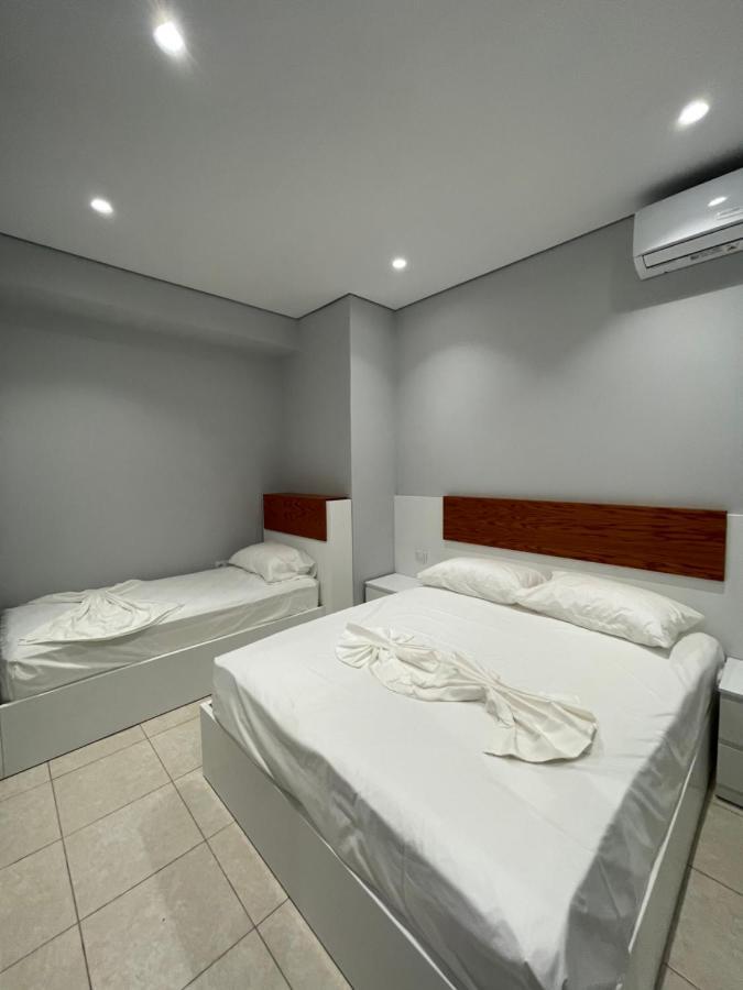 Emerald Inn Apartments โอริคูม ภายนอก รูปภาพ